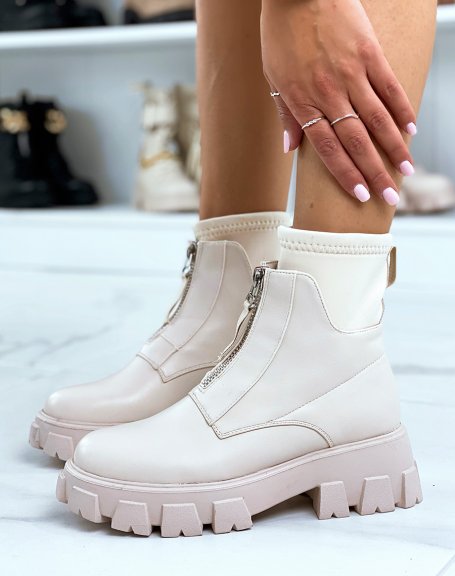 Beige zipped ankle boots with large notched sock-effect sole