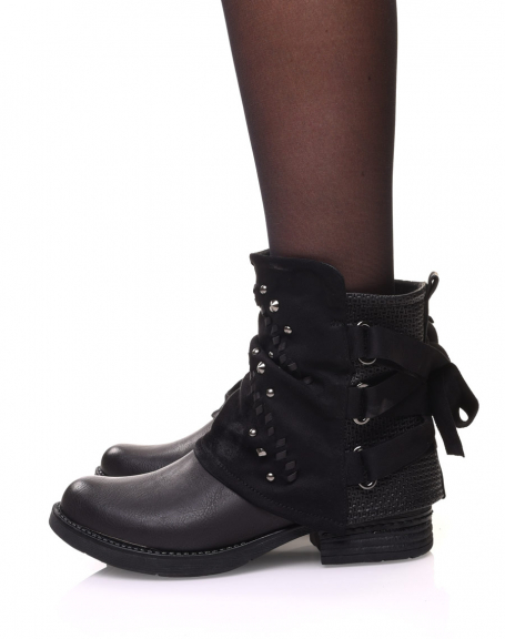 Black ankle boots with bi-material panels and bow