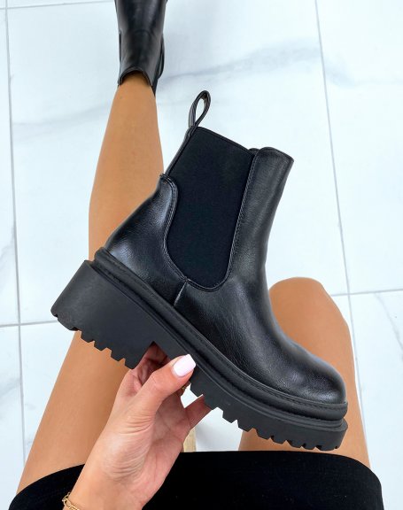 Black ankle boots with elastic and heeled sole