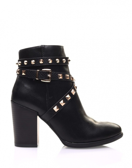 Black ankle boots with heels and pyramidal studs