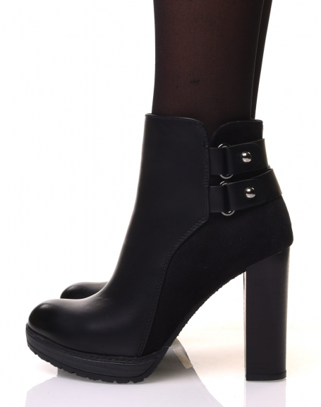 Black ankle boots with high bi-material heels