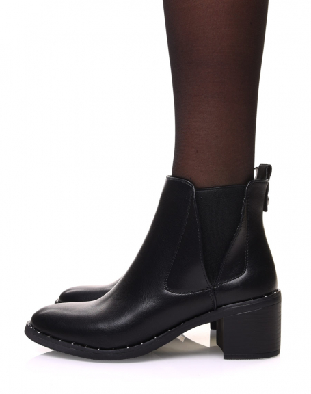 Black ankle boots with high cut elastic and mid heel