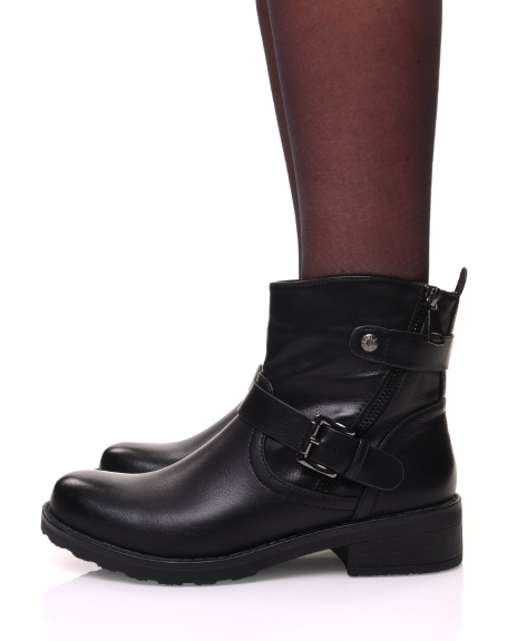 Black ankle boots with straps and zippers