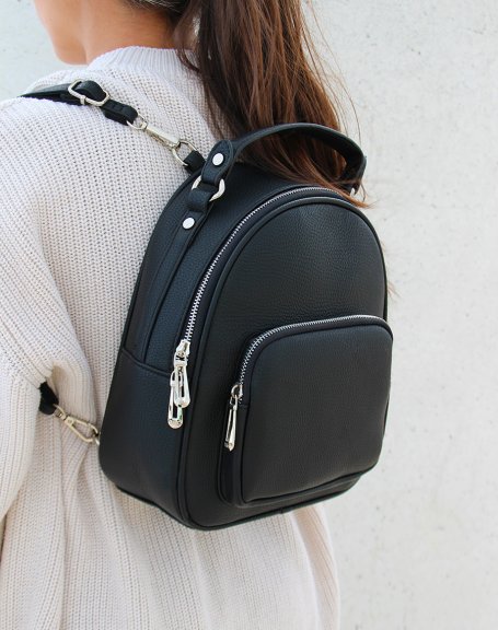 Black backpack with silver zips