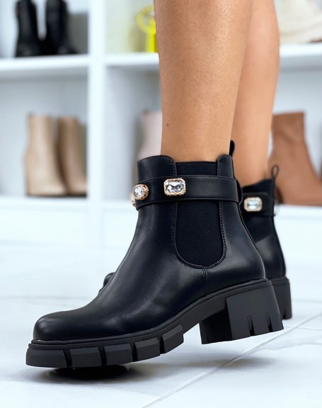 Black Chelsea boots adorned with jewels