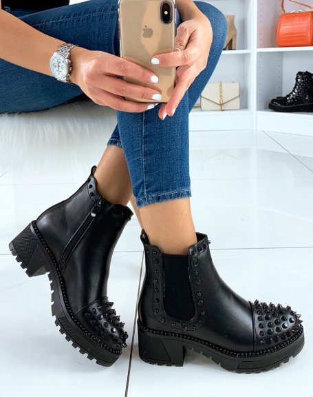 Black Chelsea boots with a smooth effect and black studs