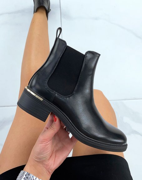 Black Chelsea boots with gold detail