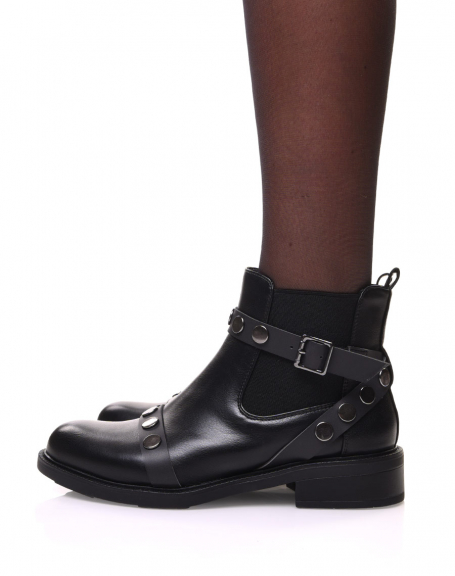 Black Chelsea boots with studded straps