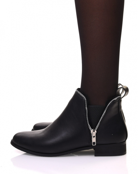 Black Chelsea boots with zipper details
