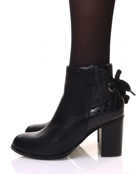Black crocodile ankle boots with heel and bow details