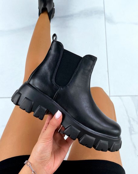 Black elastic ankle boots with notched soles