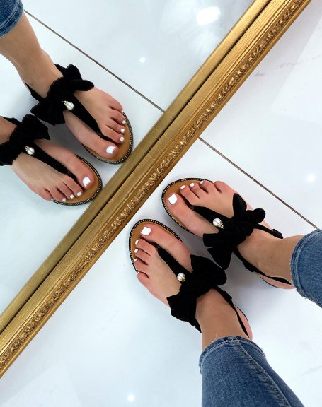 Black flat sandals with bow and small pearl
