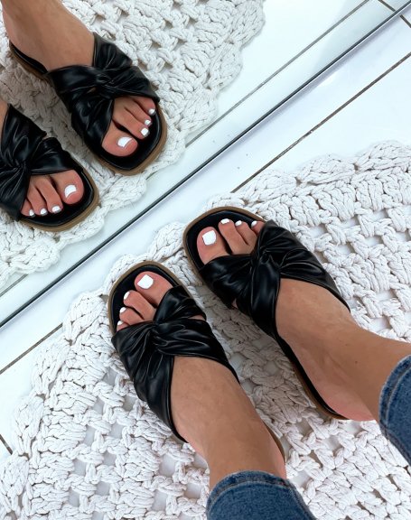 Black flat sandals with crisscross straps