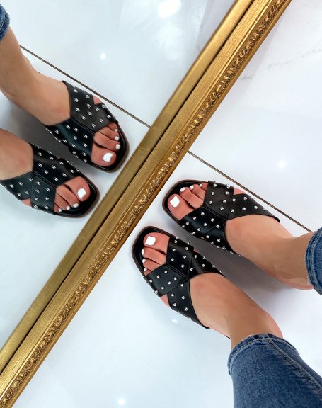 Black flat sandals with crisscross studded straps