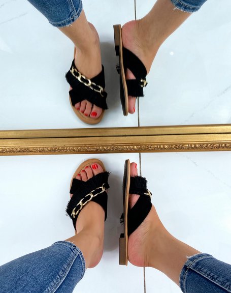Black flat sandals with fringe and gold chain