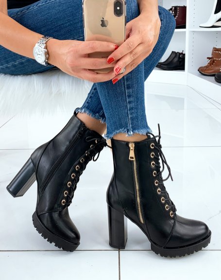 Black heeled ankle boots with gold details