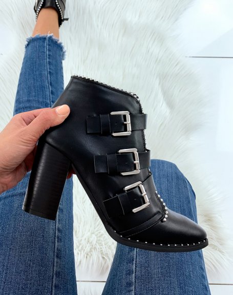 Black heeled ankle boots with multiple studded straps