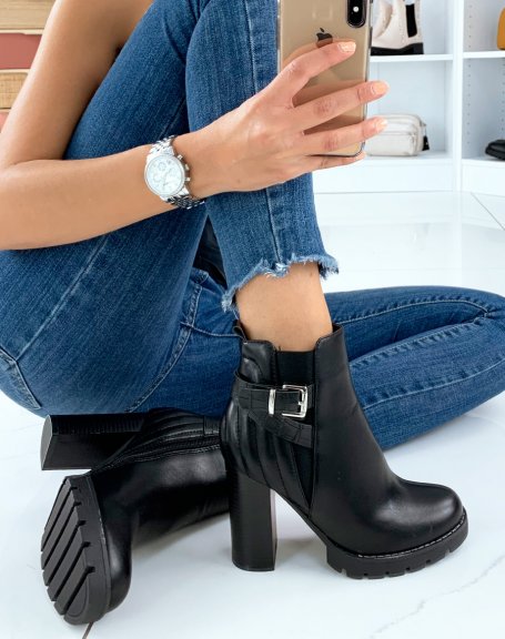 Black heeled ankle boots with strap