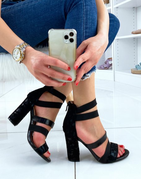 Black heeled sandals with elastic straps and python effect