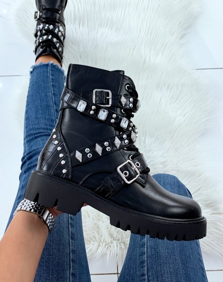 Black high ankle boots adorned with studded straps