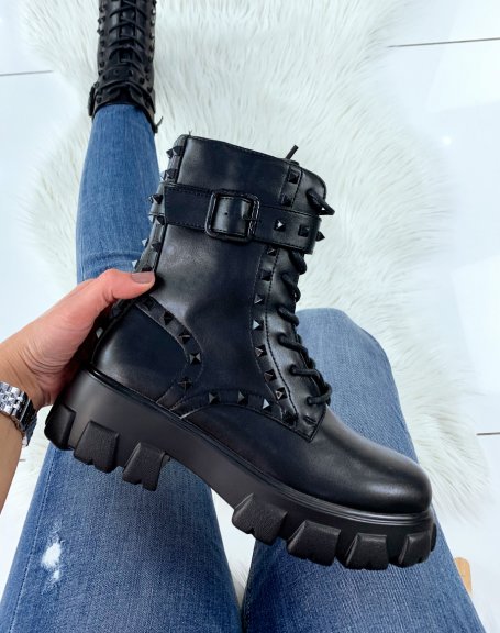 Black high ankle boots with black embossed studs