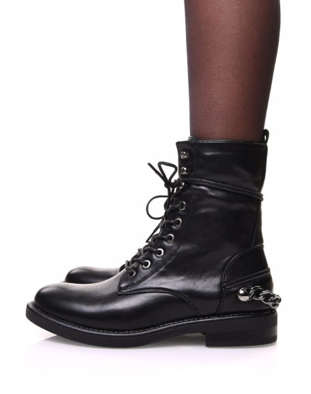 Black high ankle boots with chain at the back