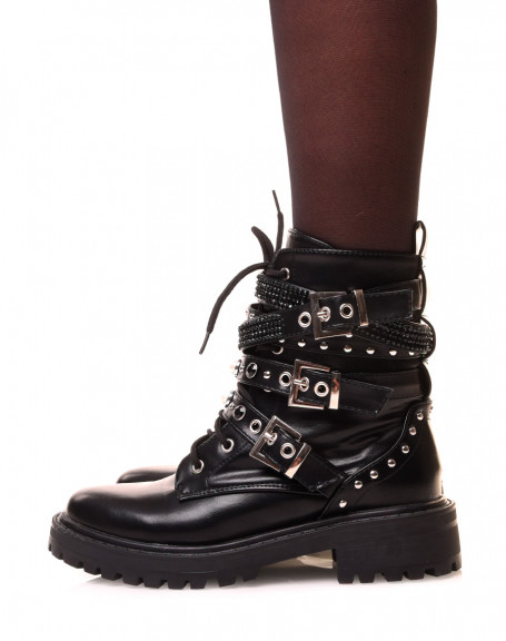 Black high ankle boots with multiple straps adorned with pearls and studs