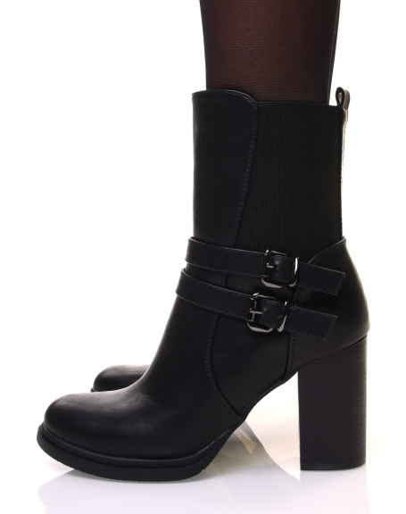Black high heel ankle boots with straps