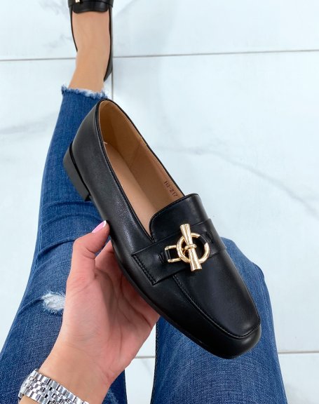 Black loafers with golden buckle