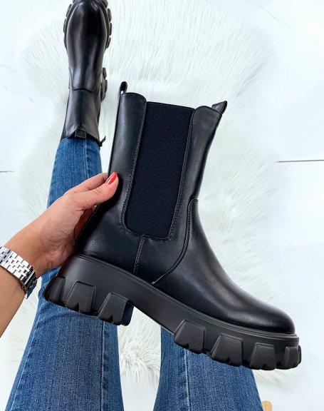 Black mid-calf boots with chunky lug sole