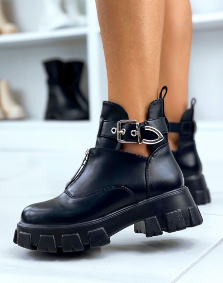 Black open ankle boots zipped with straps and notched soles