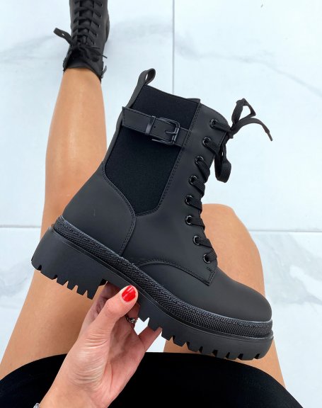Black rubberized ankle boots with elastic