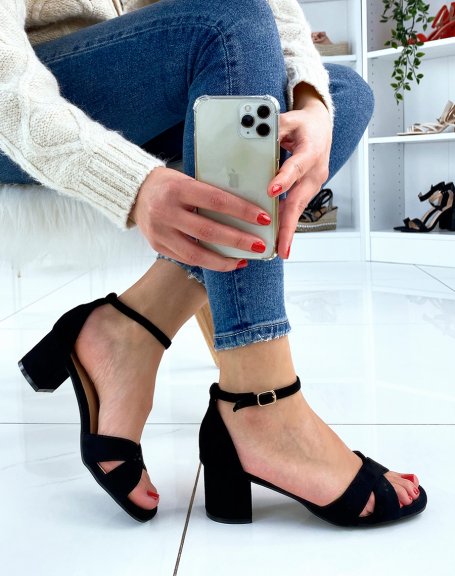Black sandal with crisscrossed straps and square heel