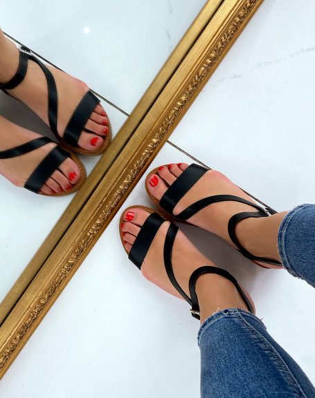 Black sandals with asymmetrical straps