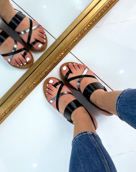 Black sandals with crossed straps