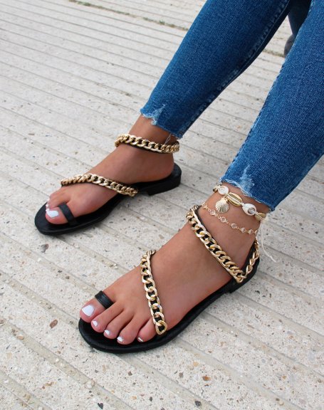 Black sandals with golden chains