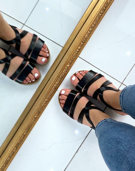 Black sandals with silver sole