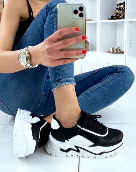 Black sneakers with large white platform