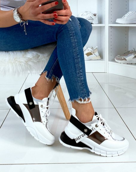 Black sneakers with multiple panels and fancy sole