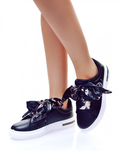 Black sneakers with ribbons