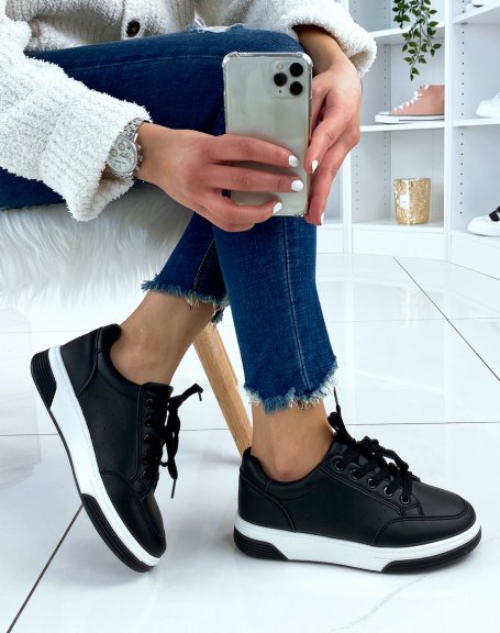 Black sneakers with white soles