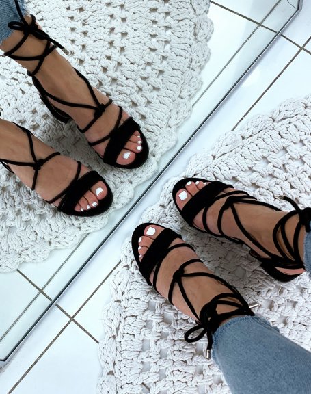 Black suedette sandals with low heels and ankle laces