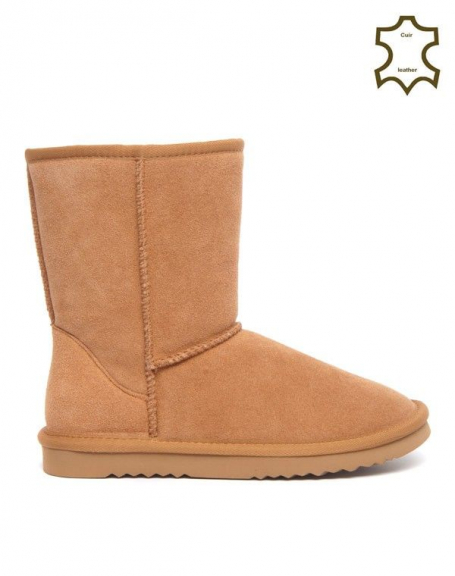 Boot lined in camel leather with visible seams