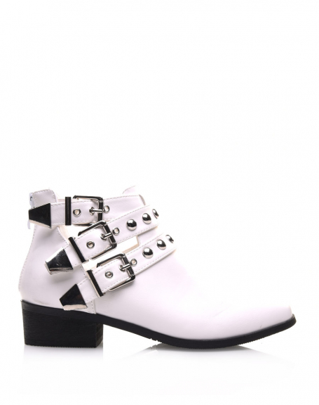 Flat white ankle boots with different studded straps