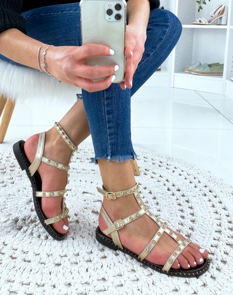 Gold studded flat sandals