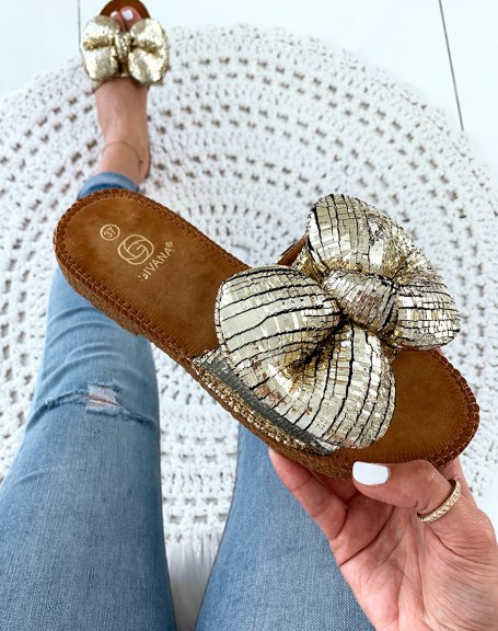 Golden sandal with big puffy knot