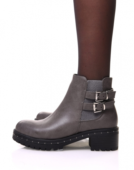 Gray ankle boots with lugged and studded sole