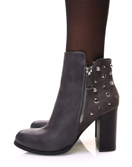 Gray bi-material ankle boots with heels and studded details
