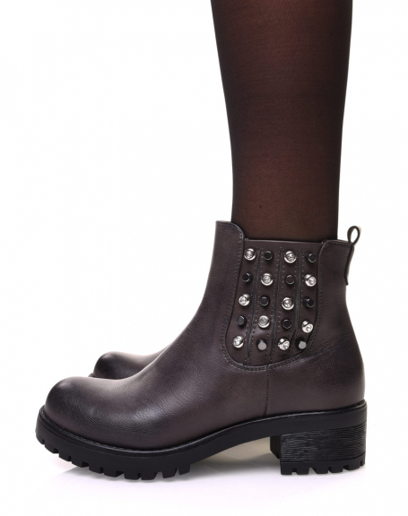Gray Chelsea boots with studded details