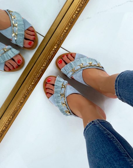 Light blue flat sandals with fringe and gold chain